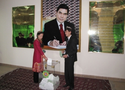 A Turkmen woman and a man cast their ballots at a polling station in Ashgabat, Turkmenistan on December 5, 2010. (STR/AFP/Getty Images)