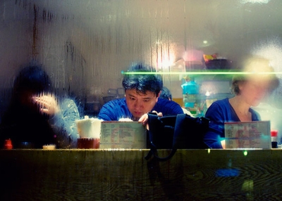 Customers studying a menu at a Japanese restaurant. (christophe HUE/flickr)