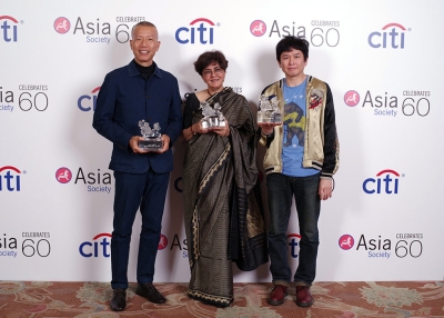 (L to R) Cai Guo-Qiang, Nalini Malani, and Yoshitomo Nara pose with their Asian Art Game Changer awards in Hong Kong on March 20, 2016.