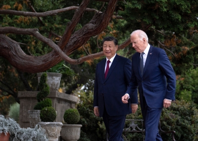 US President Joe Biden (R) and Chinese President Xi Jinping walk together after a meeting during the Asia-Pacific Economic Cooperation (APEC) Leaders' week in Woodside, California on November 15, 2023. 